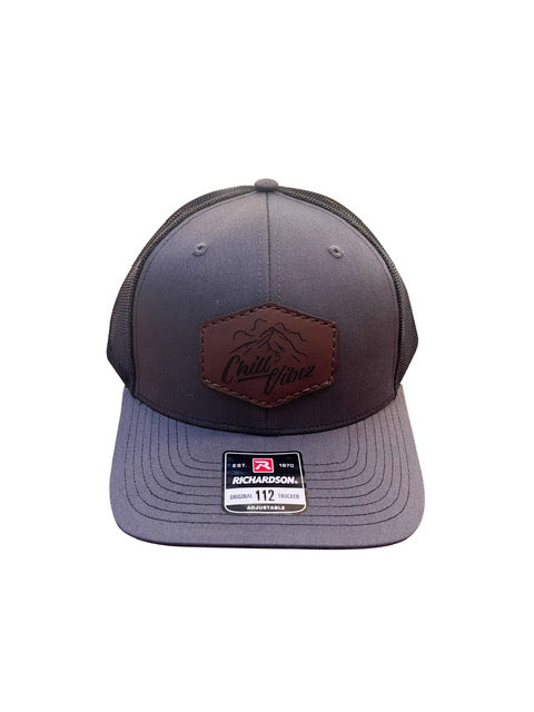 CHARCOAL/BLACK LEATHER PATCH TRUCKER HAT